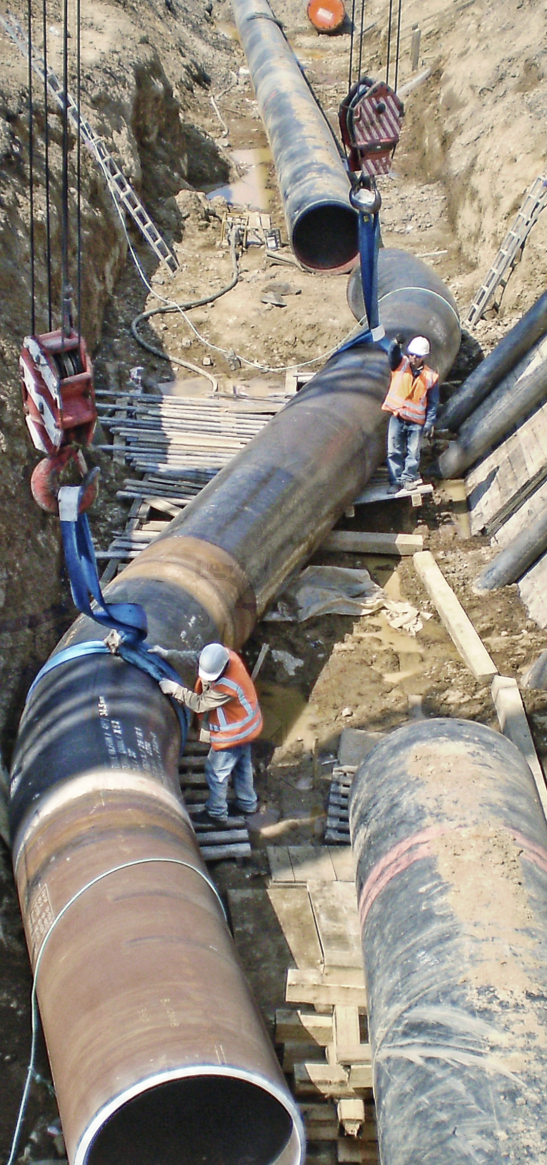 men building a pipeline